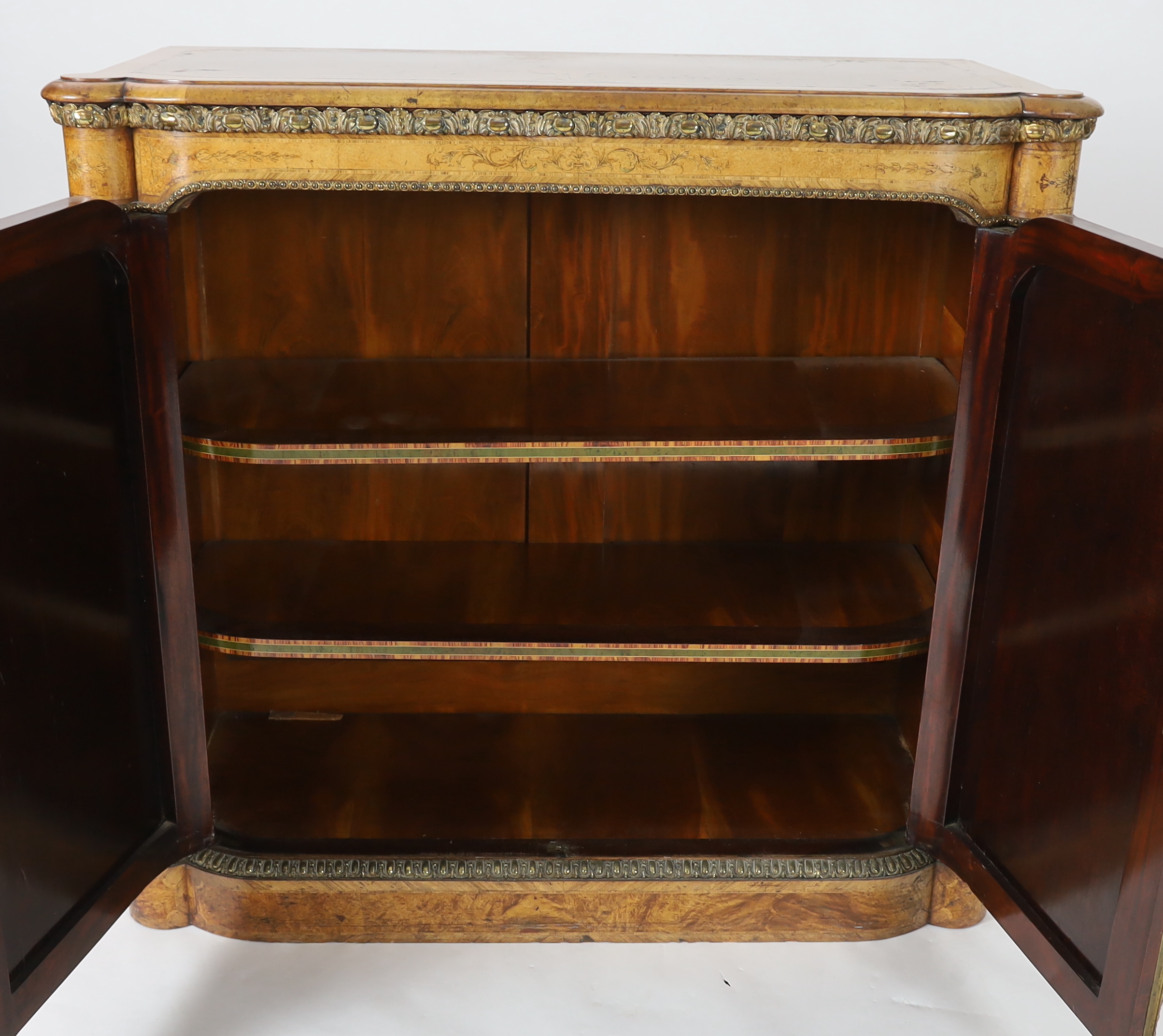 A Victorian marquetry inlaid burr walnut side cabinet 112cm wide, 48cm deep, 104cm high